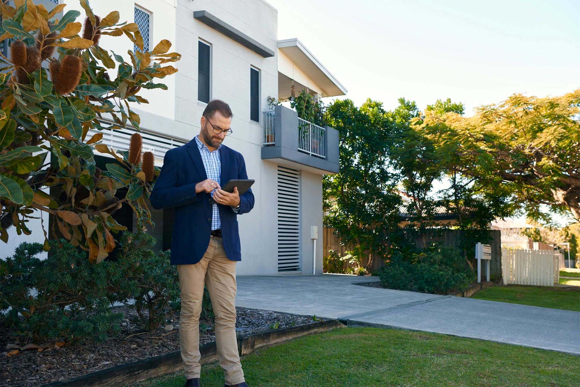 Property valuer completing Brisbane valuation outside units - CSA Valuers property valuation company Brisbane